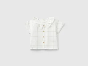 Camisa de cuadros con volantes